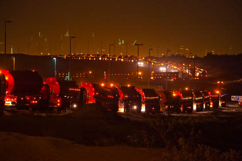 Sewage Trucks Queue: When Gas is Cheap Why Build Infrastructure?