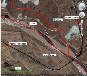 This is an aerial photo showing the triple border shared by Russia, China, and North Korea. The labels show a 